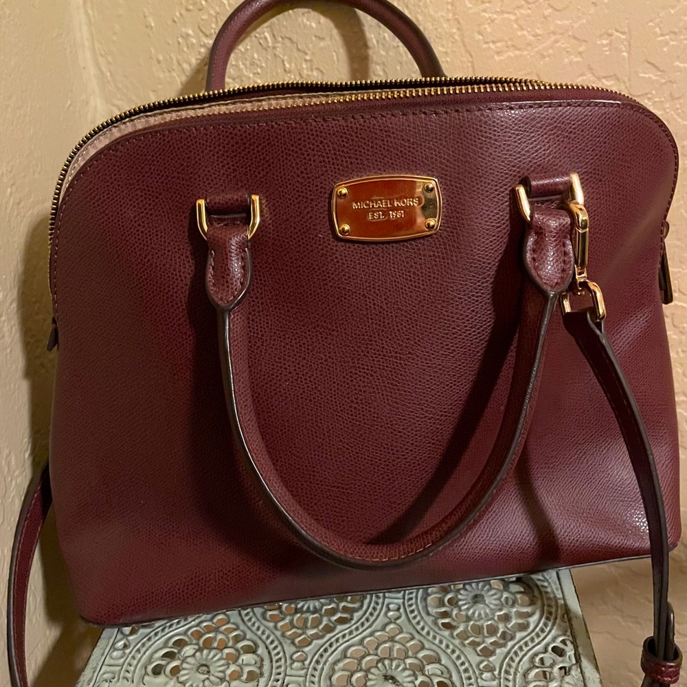 Dark maroon (the color “Berry”) Michael Kors